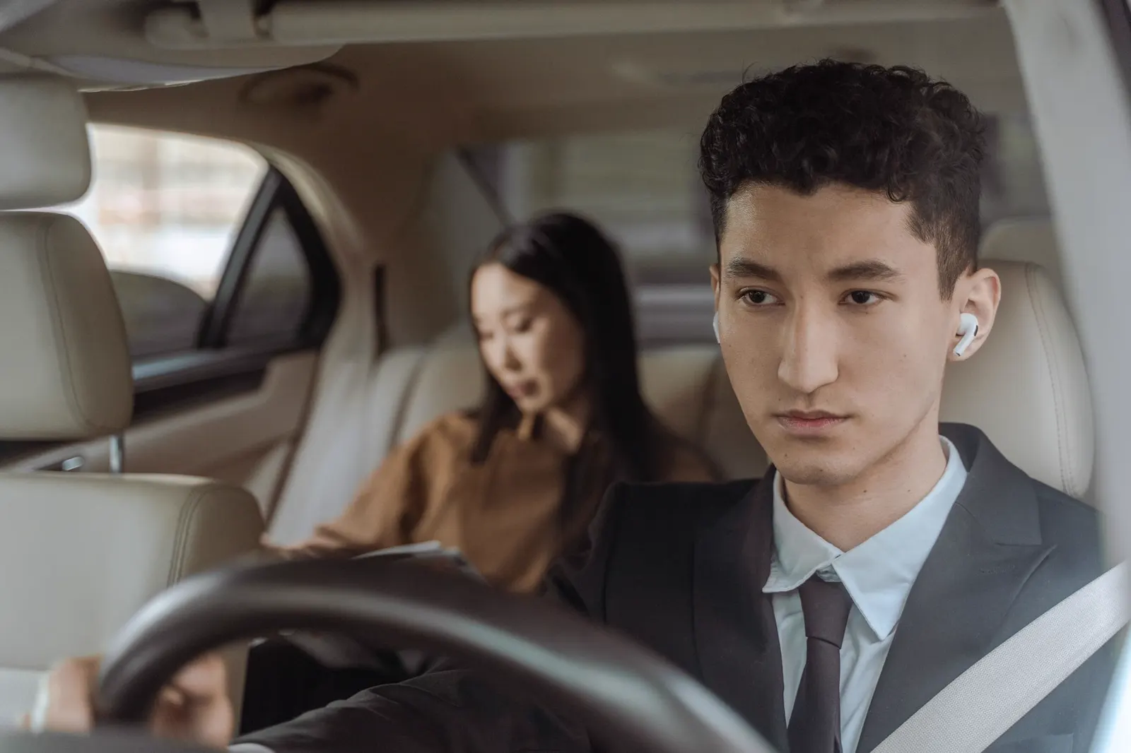 Driver and passenger inside the car